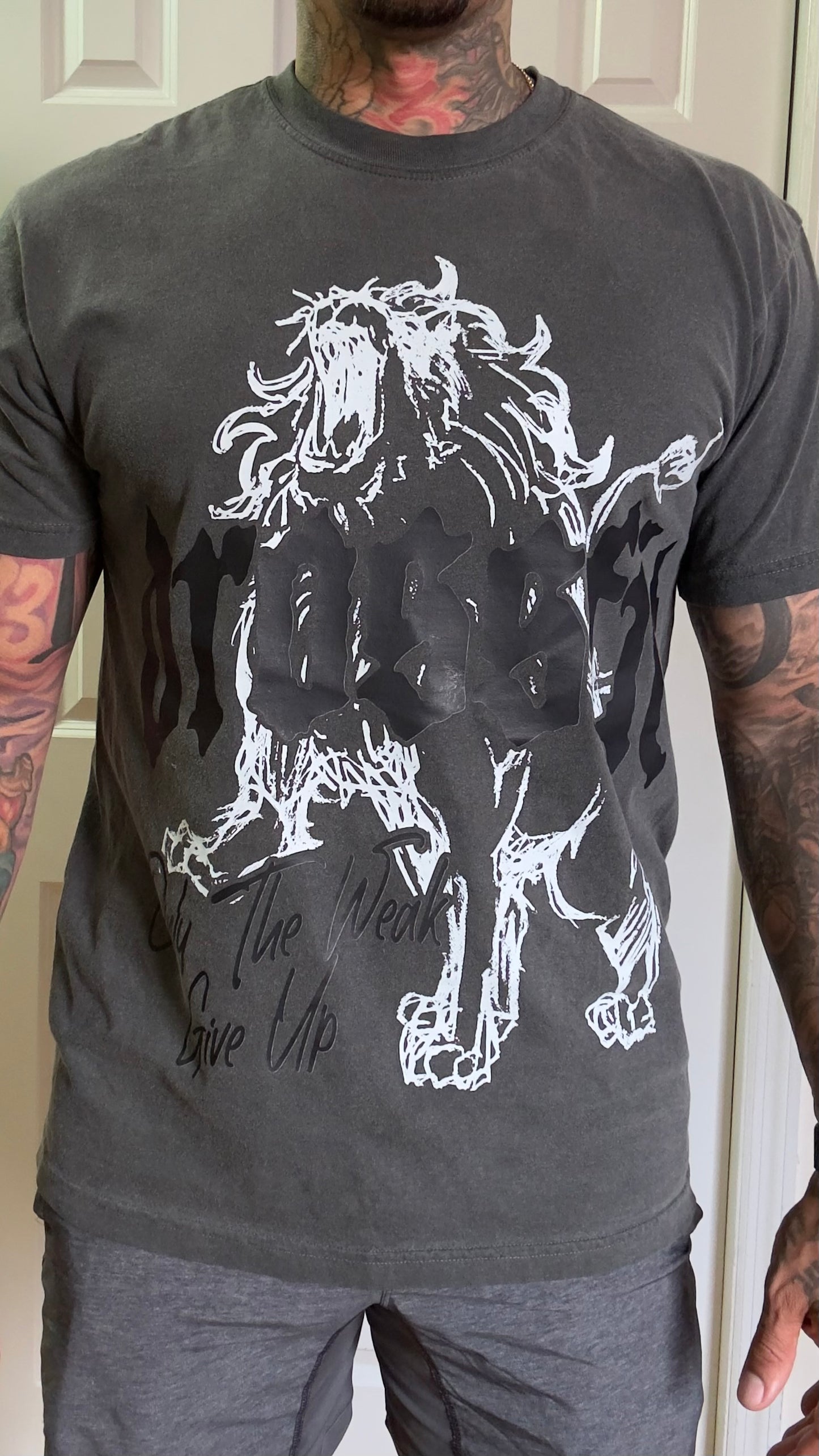 ONLY THE WEAK GIVE UP oversized front design