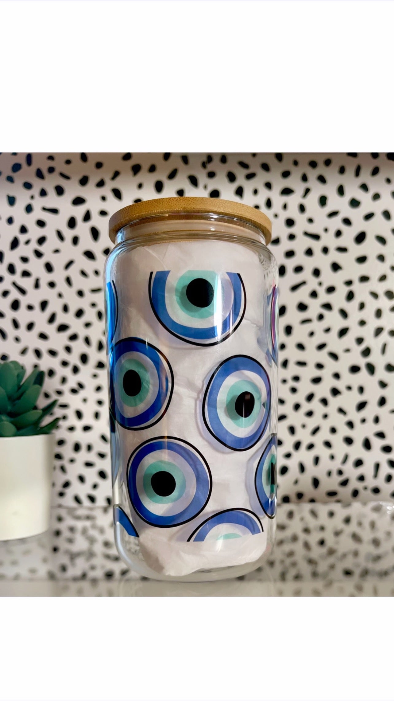 Evil eye glass can