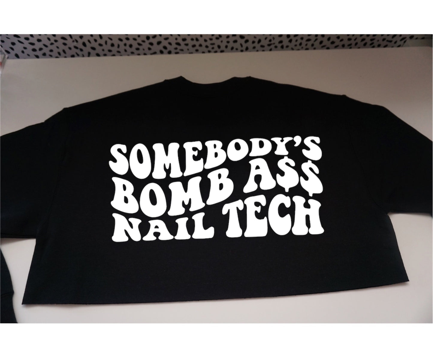 SOMEBODY’S BOMB ASS NAIL TECH sweatshirt.